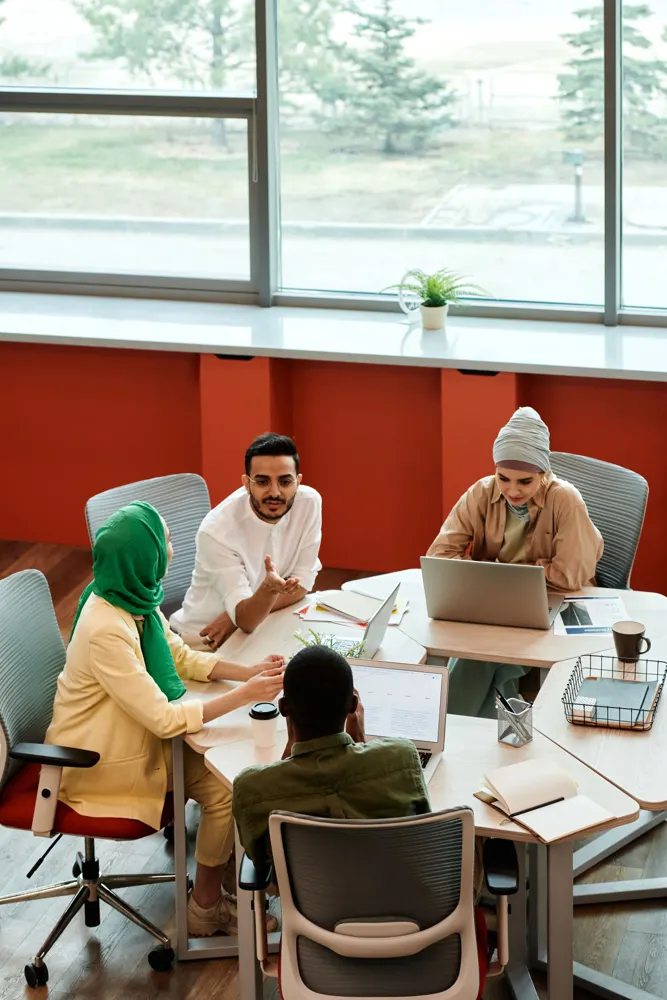 Business professionals reviewing information in an office