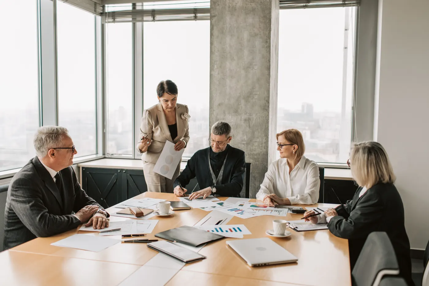 Business team reviewing financial plans in a meeting